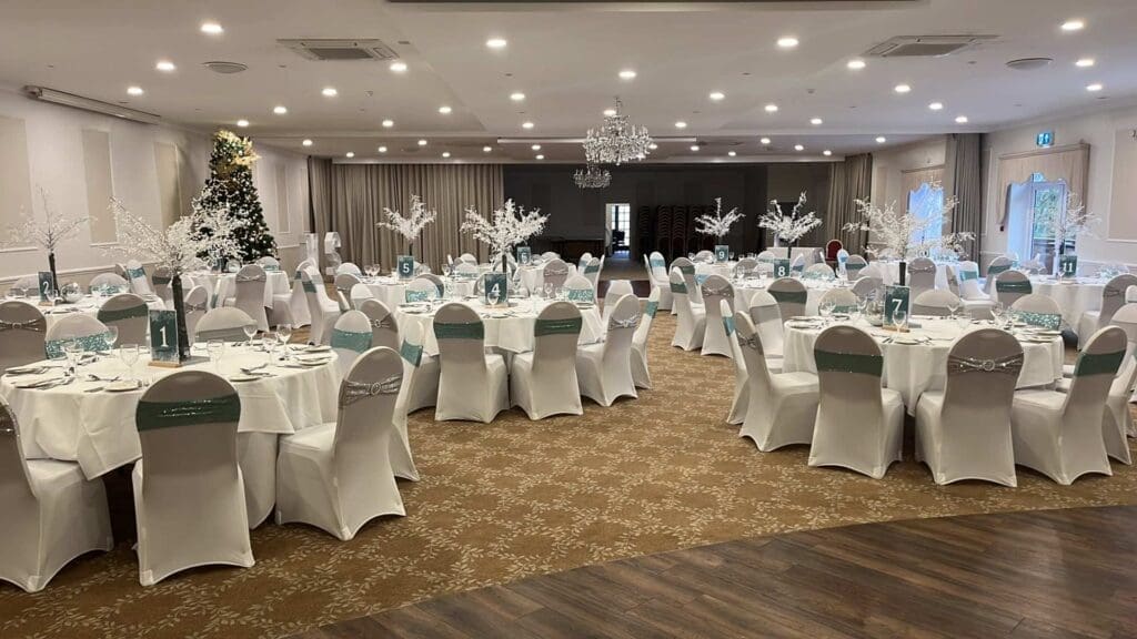 Winter wonderland Christmas party styling with silver table decor, West Midlands