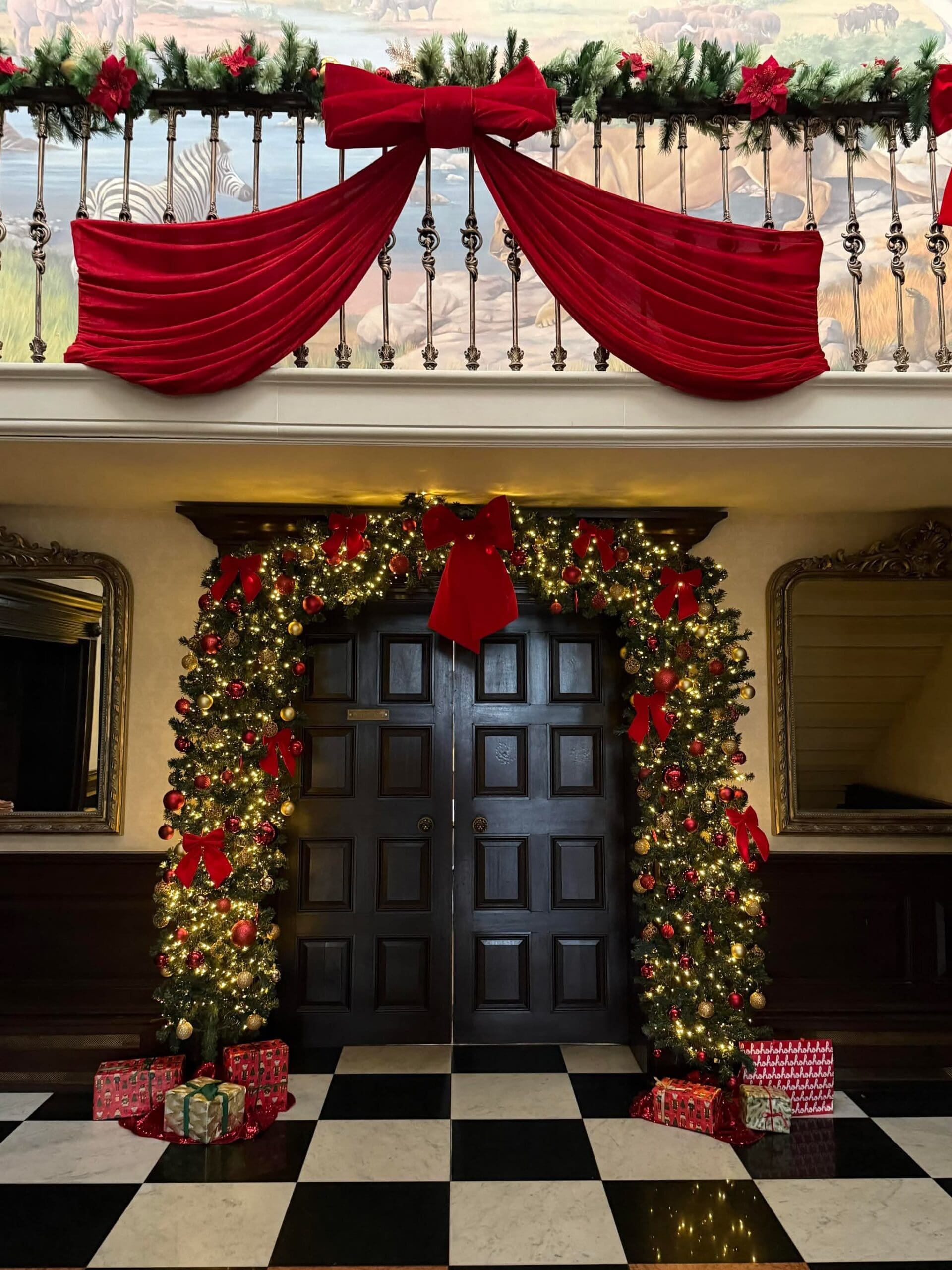 Christmas garland and wreath installation on a staircase and front door, Worcestershire